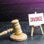 judge hammer and divorce sign